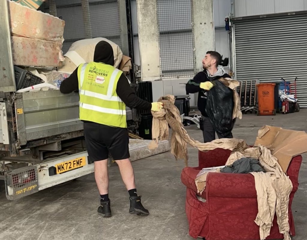 Uniformed crew loading furniture