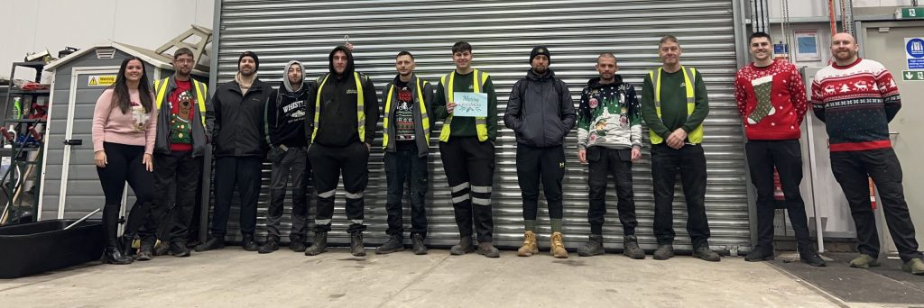 Group Picture of the team at Christmas 2025