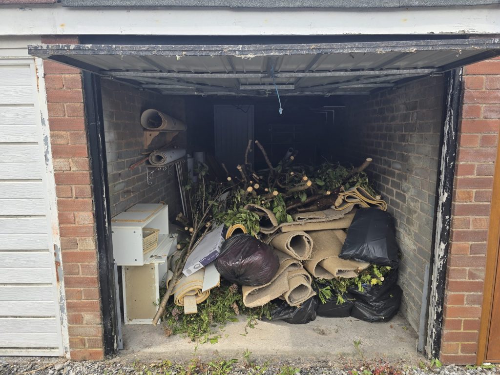 Green waste, black bags and carpet cleared from a single garage in Stockbridge.