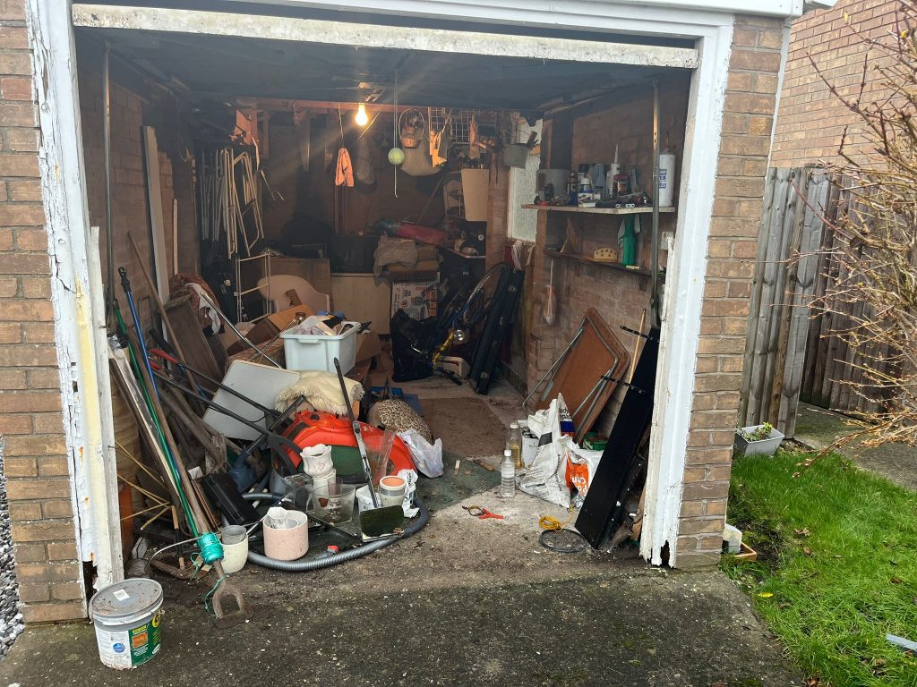 A picture of a St Helens garage before the Rubbish Removers completed the clearance.