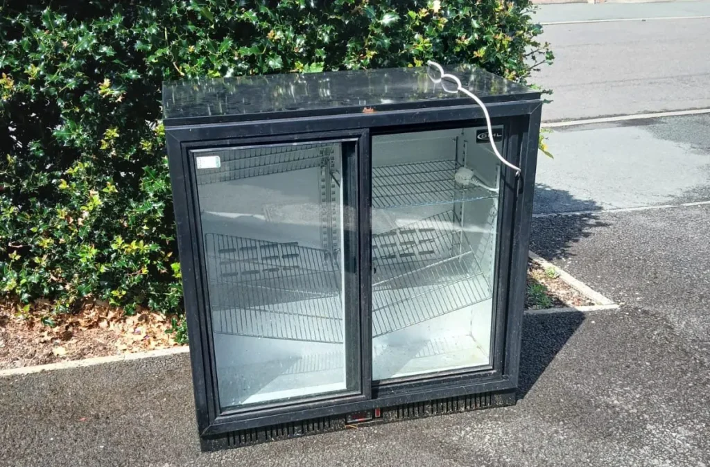 A picture of a commercial fridge removed by the Rubbish Removers.