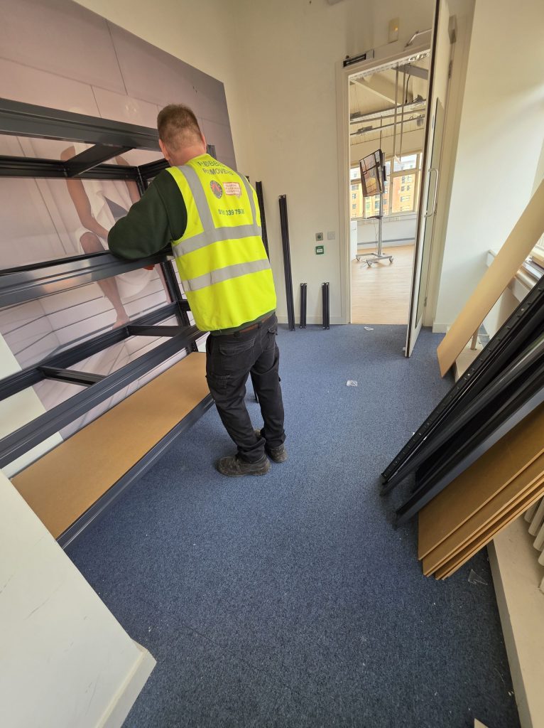 Our Manchester Office Clearance team using appropriate equipment and handling methods to protect both our team and the building
