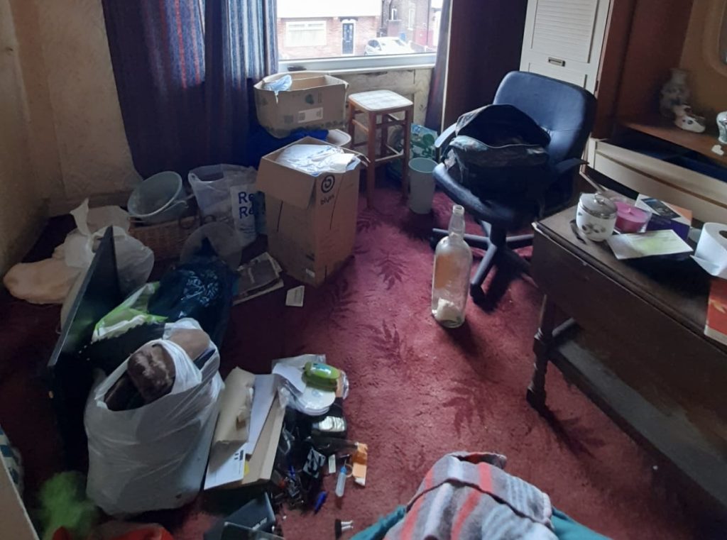 A picture showing a room filled with furniture and general waste that the Rubbish Removers cleared.