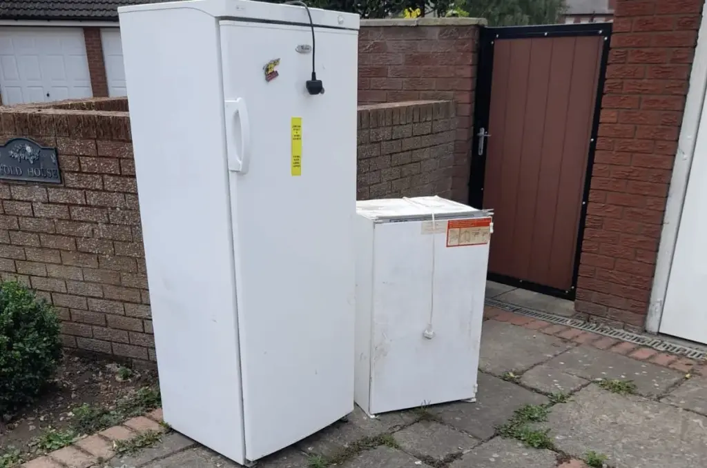 A picture of a regular and under counter fridge that the Rubbish Removers cleared.