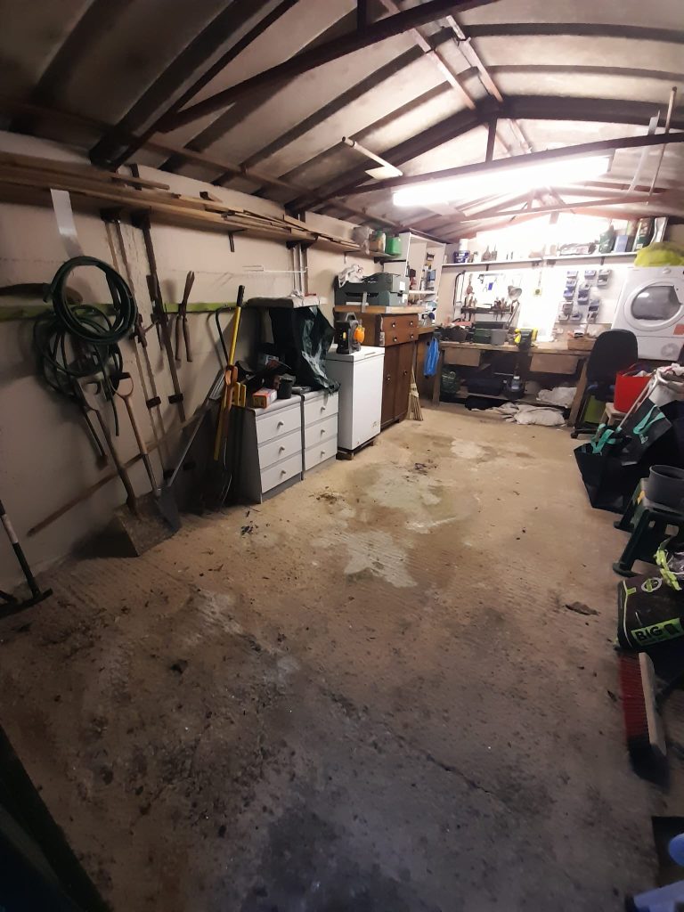 Image of a garage and it's contents before we cleared it out.