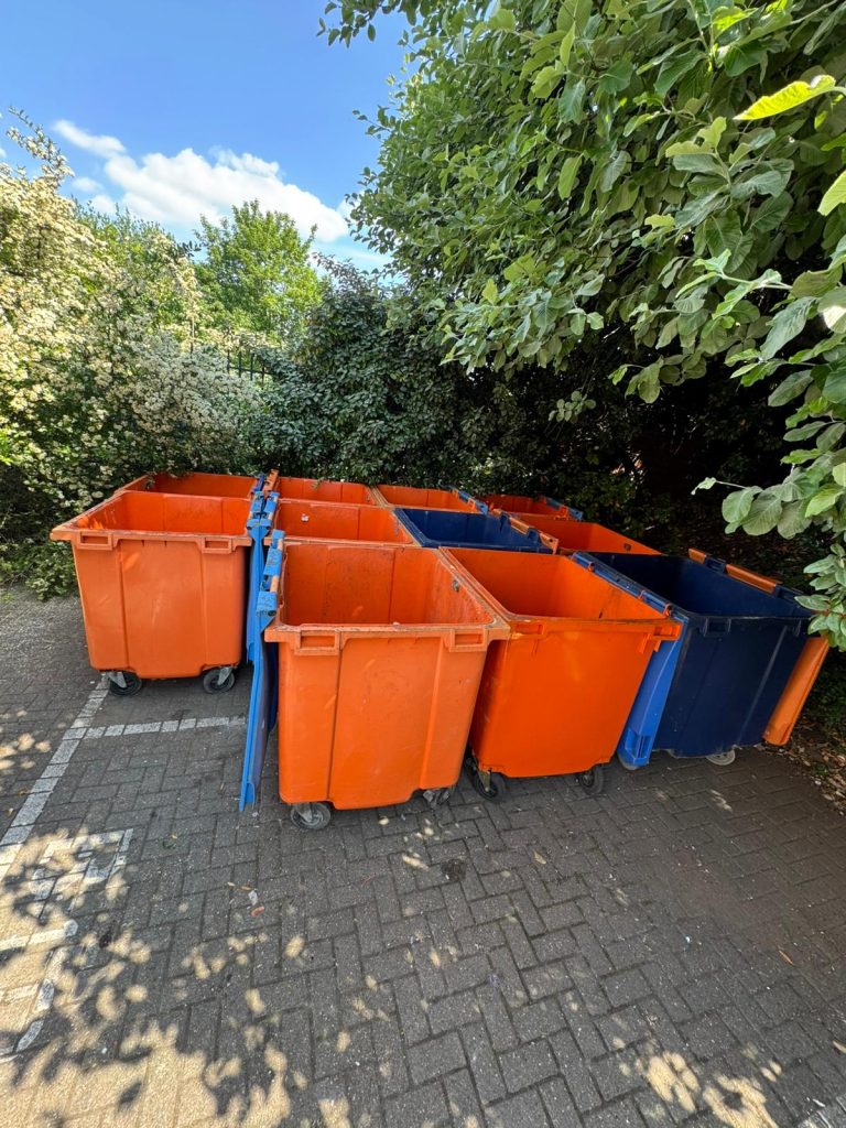 Multiple 1100 ltr bins emptied by our waste operatives and left tidy.