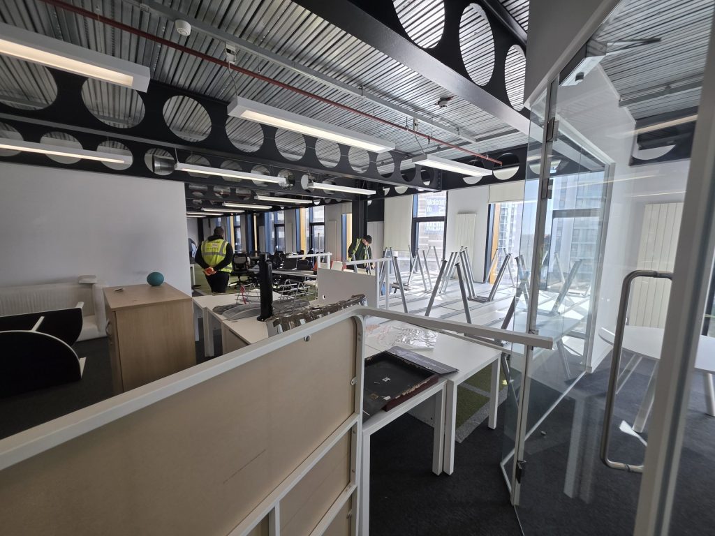 office furniture staged for removal during office clearance in MediaCity