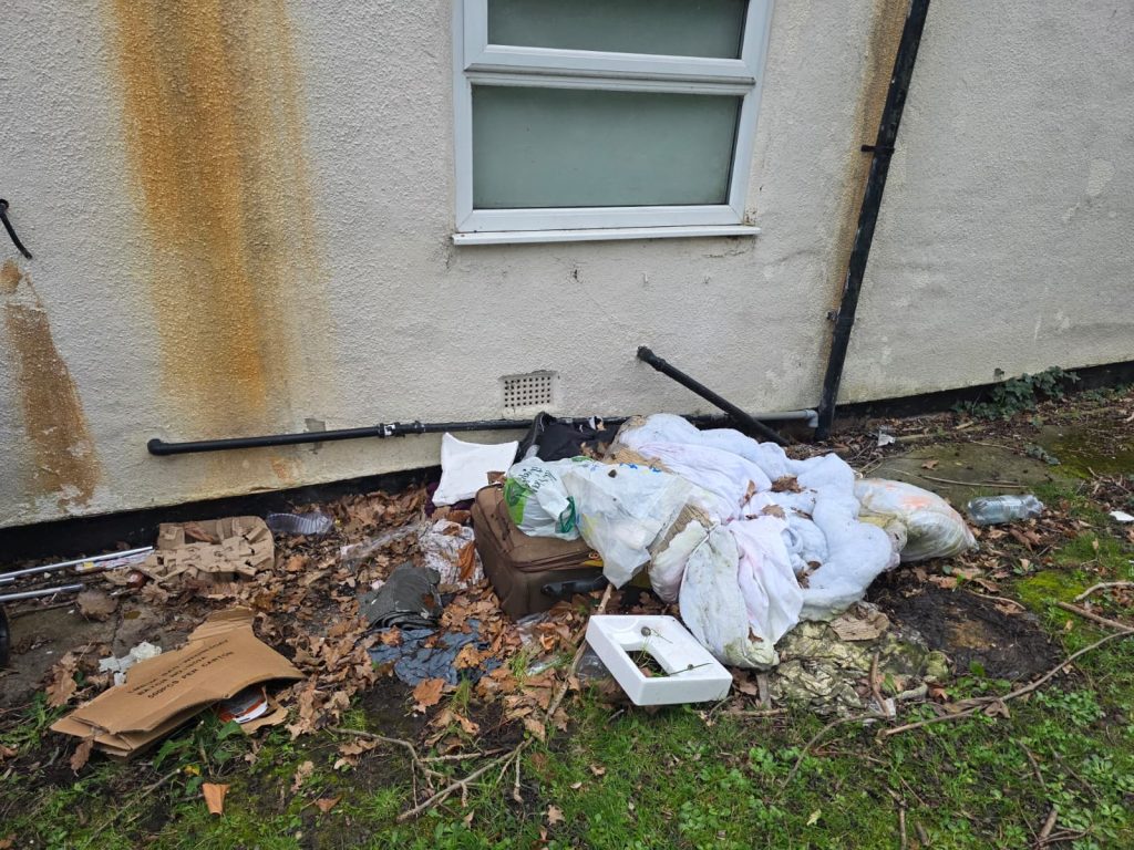 Mixed general waste dumped outside a property in South Ribble