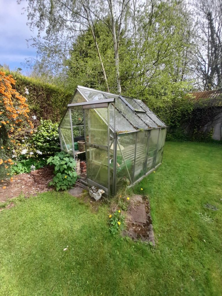 Greenhouse that we dismantled and removed.