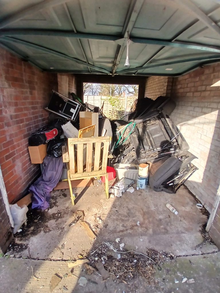 Image of a garage full of general waste.